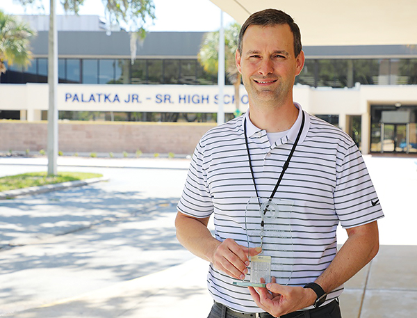 Photos courtesy of the Putnam County School District – Palatka Junior-Senior High School Assistant Principal Michael Chaires holds the award he received for being named the state's Assistant Principal of the Year.