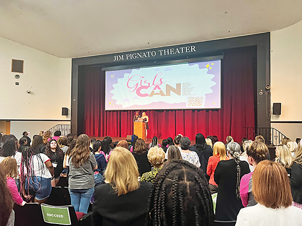 SARAH CAVACINI/Palatka Daily News – Putnam County women and high school girls gather in the Jim Pignato Theater in Palatka on Friday to listen to 4th Judicial Circuit Judge Angela Cox and her daughter, Morgan.