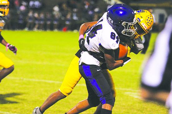 Palatka’s Chavaris Dumas makes a tackle against Space Coast’s Brandon Wiggins (84) during the first half of the Panthers’ 61-8 victory on Oct. 7. (MARK BLUMENTHAL / Palatka Daily News)