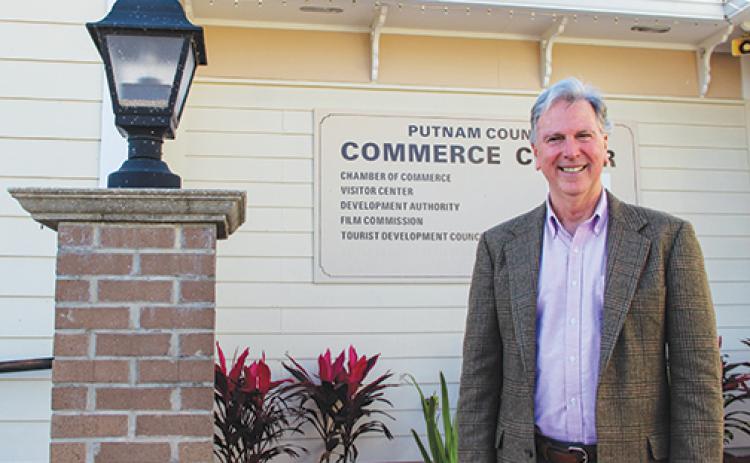 Small Business Development Center consultant Rick Paul smiles in front of the Putnam County Chamber of Commerce on Wednesday after talking about a small business workshop coming up next week.