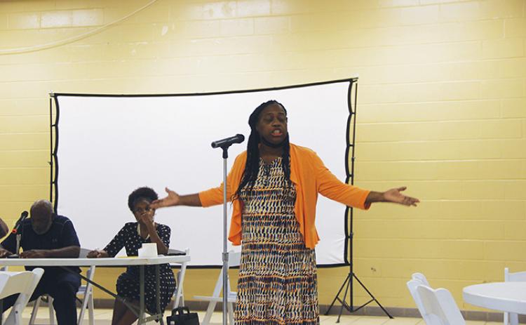 Pastor Beverly Canty speaks at the first public meeting of the Putnam Community Action Network on Monday evening at the Price-Martin Community Center in Palatka.