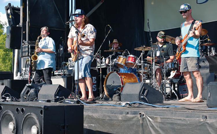 The band Paper City Hustlers performs Saturday, the second day of the Blue Crab Festival that took place this weekend for the first time since 2019.