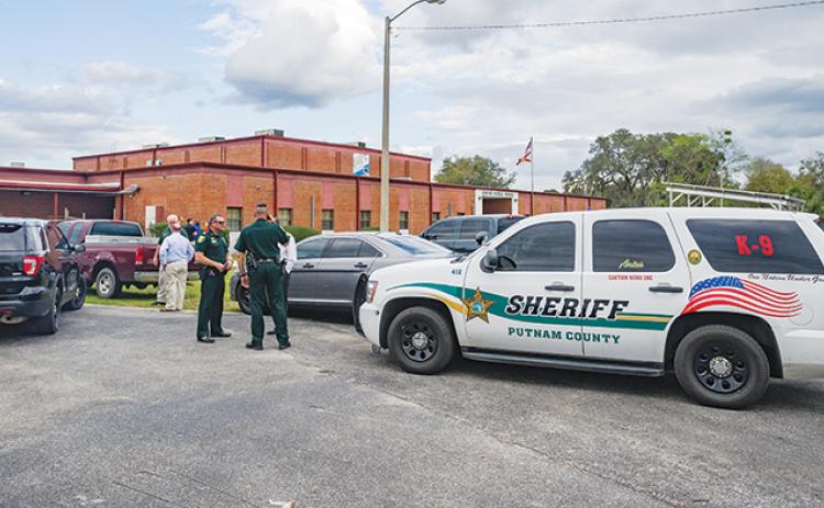Putnam County Sheriff's Office officials are outside Jenkins Middle School in 2019.
