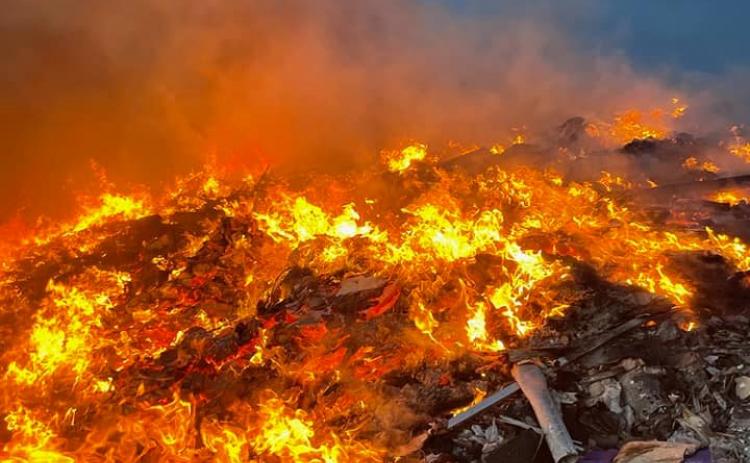 Flames blaze at Interlachen's WastePro Landfill Friday before authorities extinguished the blaze in an eight-hour effort.