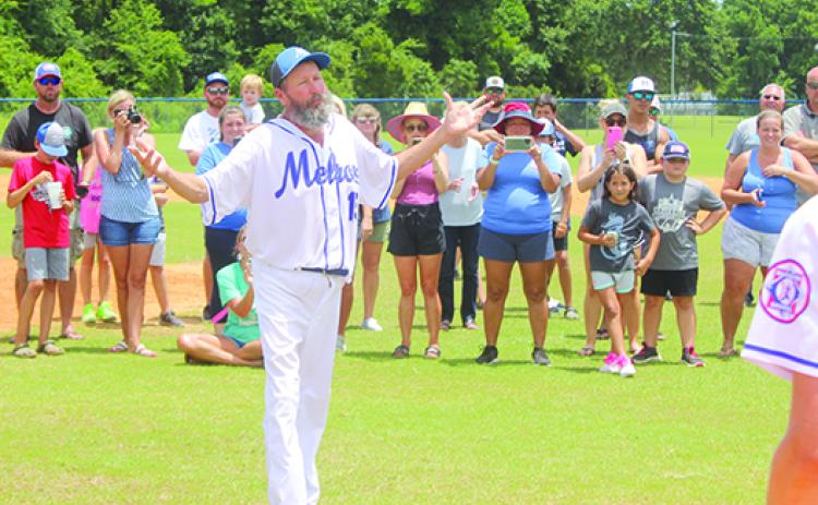 Melrose Babe Ruth 15-and-under All-Star baseball coach Dale Yarbrough addresses friends, famiy members, fellow coaches and players after his team won the North Florida championship on Sunday against West Volusia-DeBary, 15-3, in Lake City. (MARK BLUMENTHAL / Palatka Daily News)