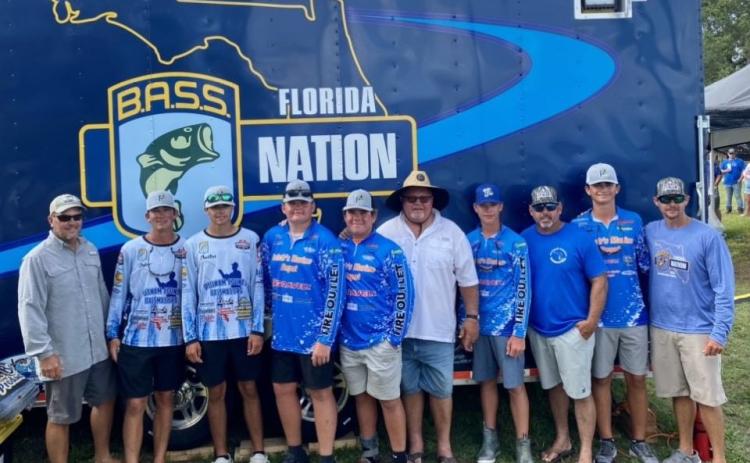 Young anglers from the Putnam County Bassmasters and their fathers will be heading to the high school national championship at Lake Hartwell in South Carolina next month. From left are Cliff Prince, Syler Prince, Austin Peters, Benjamin Clark, Barrett Clark, Preston Clark, Cody Mullis, David Mullis, Jace Akers and Jason Akers. (Special to the Daily News)