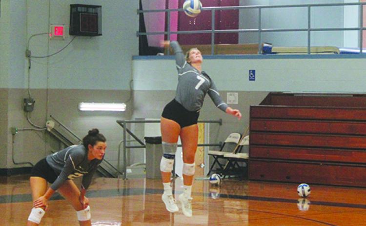 Hope Harrington delivers a serve in the St. Johns River State College scrimmage match. (MARK BLUMENTHAL / Palatka Daily News)