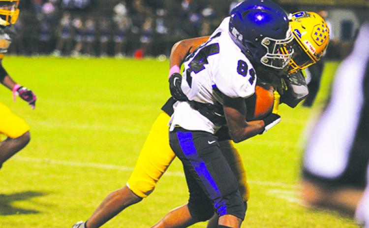 Palatka’s Chavaris Dumas makes a tackle against Space Coast’s Brandon Wiggins (84) during the first half of the Panthers’ 61-8 victory on Oct. 7. (MARK BLUMENTHAL / Palatka Daily News)
