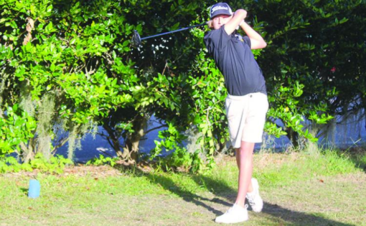 Palatka’s Luke Meredith tees off on the 10th hole during Monday’s District 4-2A tournament. (MARK BLUMENTHAL / Palatka Daily News)