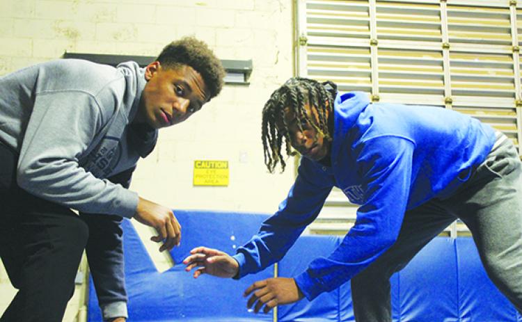 Palatka’s Mikade Harvey (left) and Ishmael Foster will compete for high placement at the FHSAA 1A wrestling championships starting today in Kissimmee. (MARK BLUMENTHAL / Palatka Daily News)