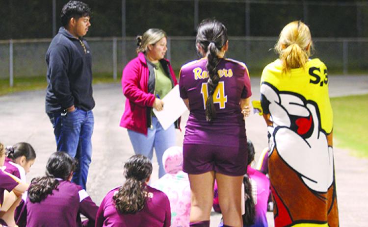 Coach Alicia Baylon (middle) and her Crescent City Junior-Senior High School girls soccer team evened its record at 3-3 on Thursday night with a victory at Deltona. (MARK BLUMENTHAL / Palatka Daily News)