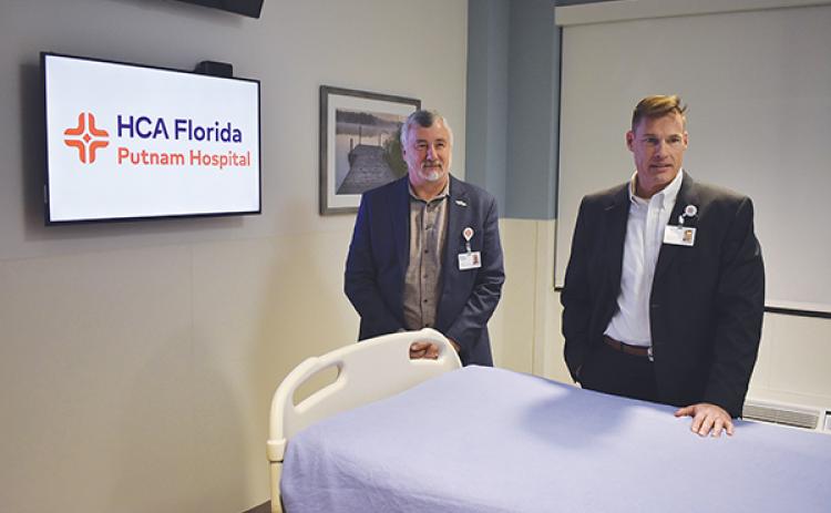 BRANDON D. OLIVER/Palatka Daily News – Wayne Placona, left, the director of facilities management at HCA Florida Putnam Hospital, and Brian Nunn, the hospital’s CEO, stand in one of the patient rooms of the new Med West Wing.
