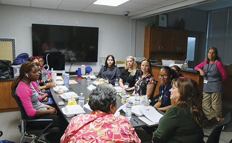 SARAH CAVACINI/Palatka Daily News – Professional women and girls from Putnam County high schools talk during Girls Can about the women’s experiences and where the girls see themselves in the future.