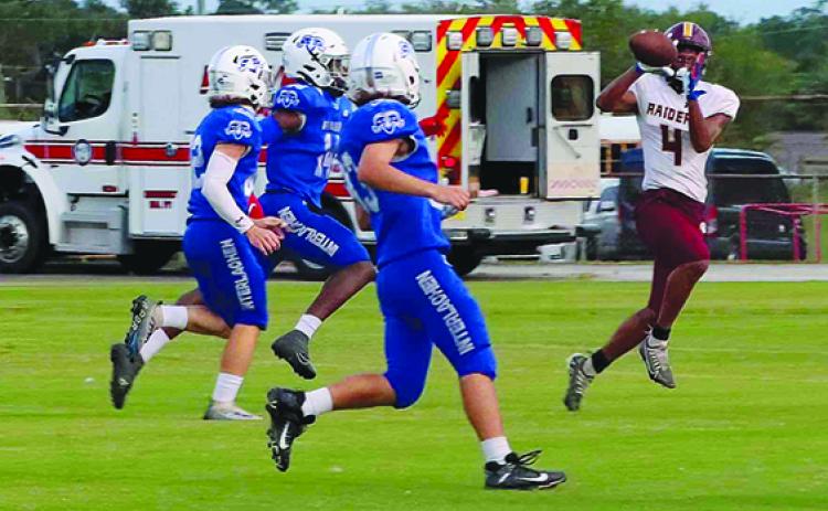 Crescent City’s Lentavius Keenon gets behind Interlachen defenders to make a catch and eventally score a touchdown during a game last season. (RITA FULLERTON / Special to the Daily News)