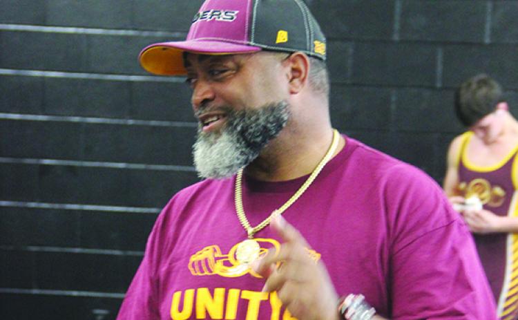Troy Henry, seen here talking during a meet last week in Interlachen, is in his second year as Crescent City Junior-Senior High School’s boys weightlifting coach. (COREY DAVIS / Palatka Daily News)